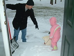 Olivia being told what to shovel