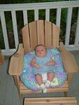 Olivia spending cocktail hour in her new chair