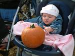 Olivia with pumpkin